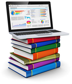 Laptop on top of a stack of books